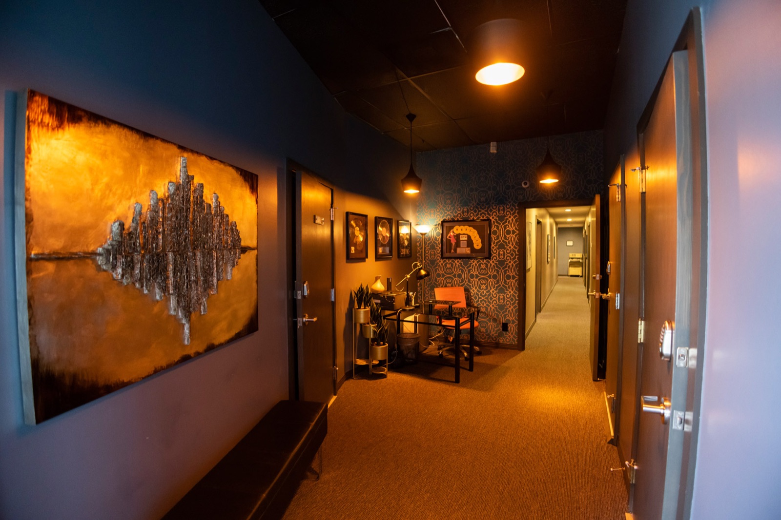 Studio entry hallway with gold records